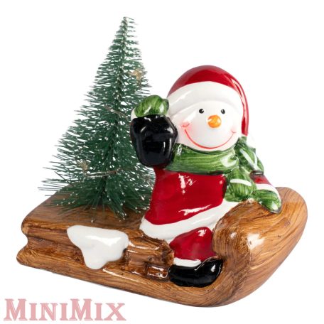 Ledes szánkózó hóember