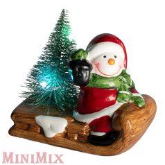 Ledes szánkózó hóember